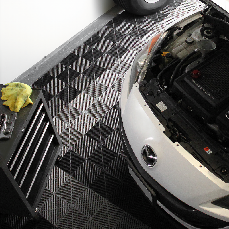 Garage floor tiles with car and toolbox